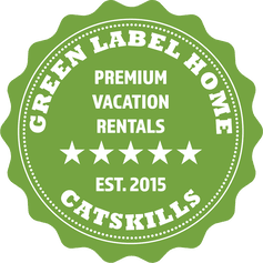 Logo of Green Label Home established in 2015 and featuring 5-star vacation rentals in the Catskills today in 2023.